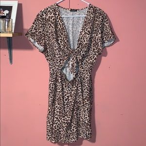 A cheetah print cut out dress
